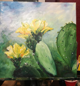 Canvas painting of flowering cactus.